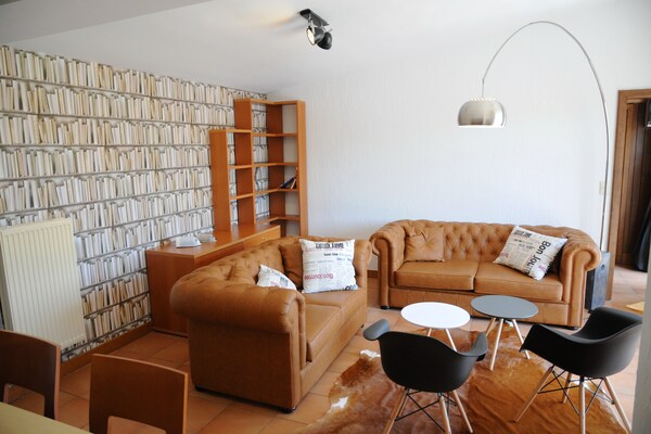 Foto van Vakantiehuis in Noiseux met privébubbelbad - Vakantiehuis in Noiseux - LivingRoom