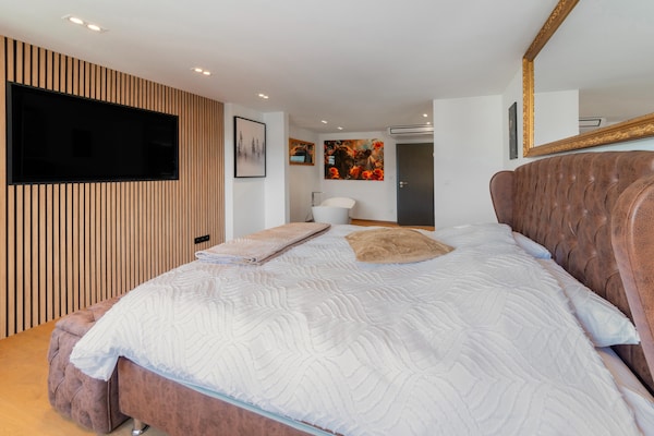 Foto van Moderne elegantie in Résidence 41 – Hart van Bastogne - BedRoom