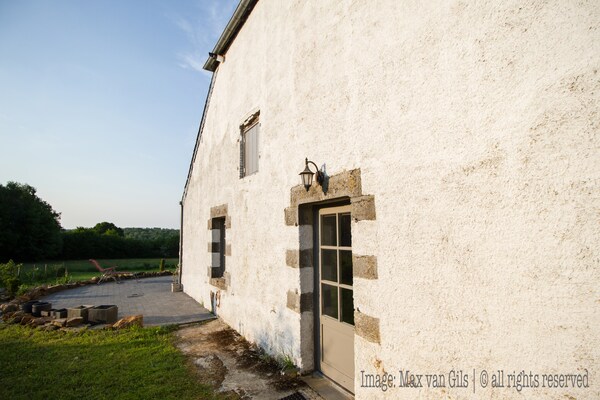 Foto van Comfortabel vakantiehuis met privé tuin - Vakantiehuis in la Neuville-aux-Joûtes - ExteriorSummer